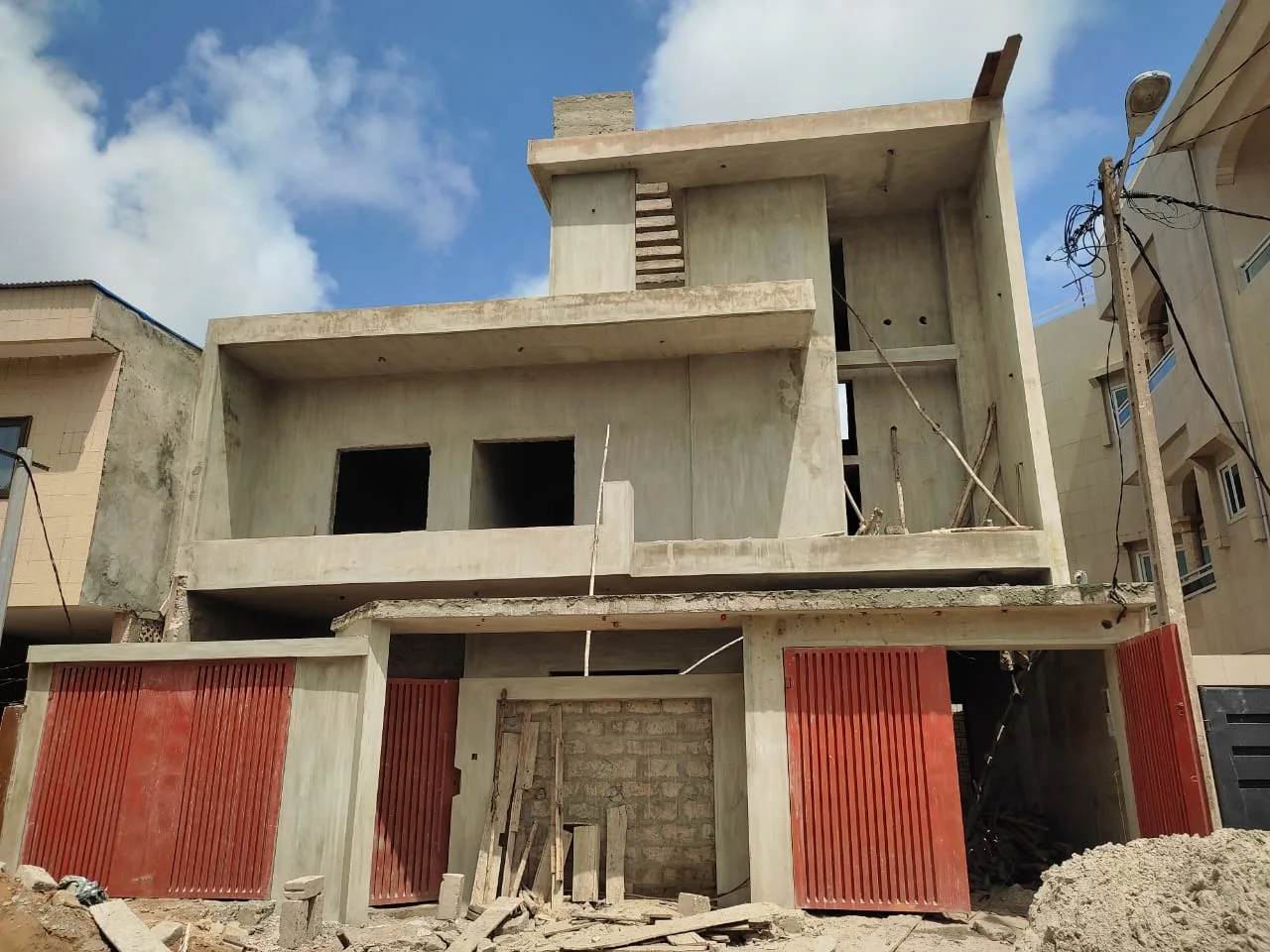 Chantier · Gros œuvre — Bâtiment en cours de construction, vue 1